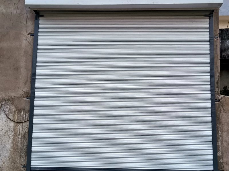 GI silver finish rolling shutter shop par installed, Nagpur